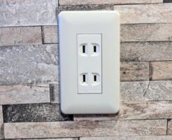 A picture resembling a household electrical outlet.